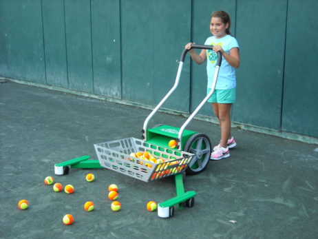 Picking up Tennis Balls is Childs Play with the Playmate Tennis Ball Mower